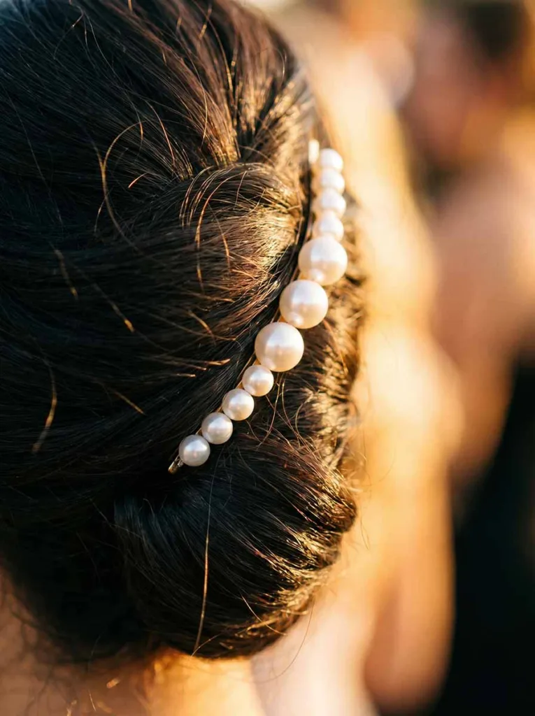 Elegant Twist Hairstyles: 10 Ideas for Every Occasion 9 French twist hairstyle with pearl bobby pin accessories elegant twist updo