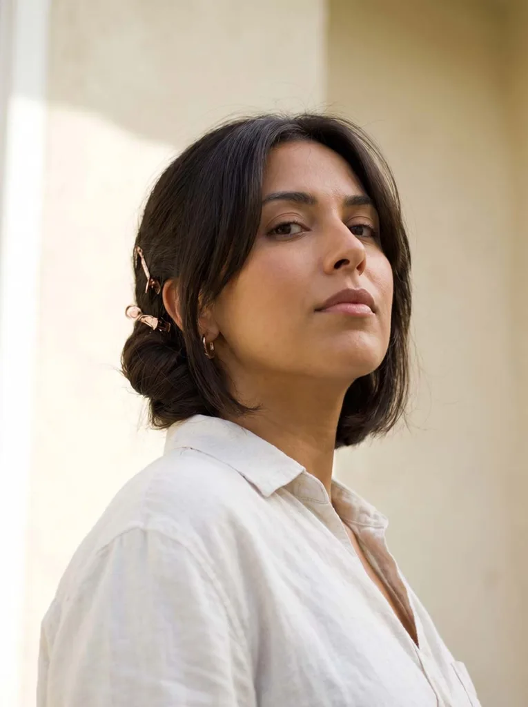 Elegant Twist Hairstyles: 10 Ideas for Every Occasion 4 Woman with short bob hair styled in a mini French twist secured with decorative pins elegant twist for short hair