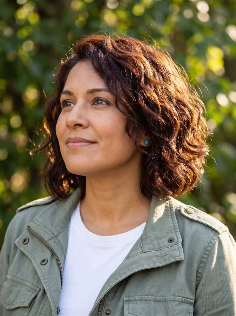 Woman with textured wavy bixie haircut air-dried with natural movement — wavy bixie hairstyle