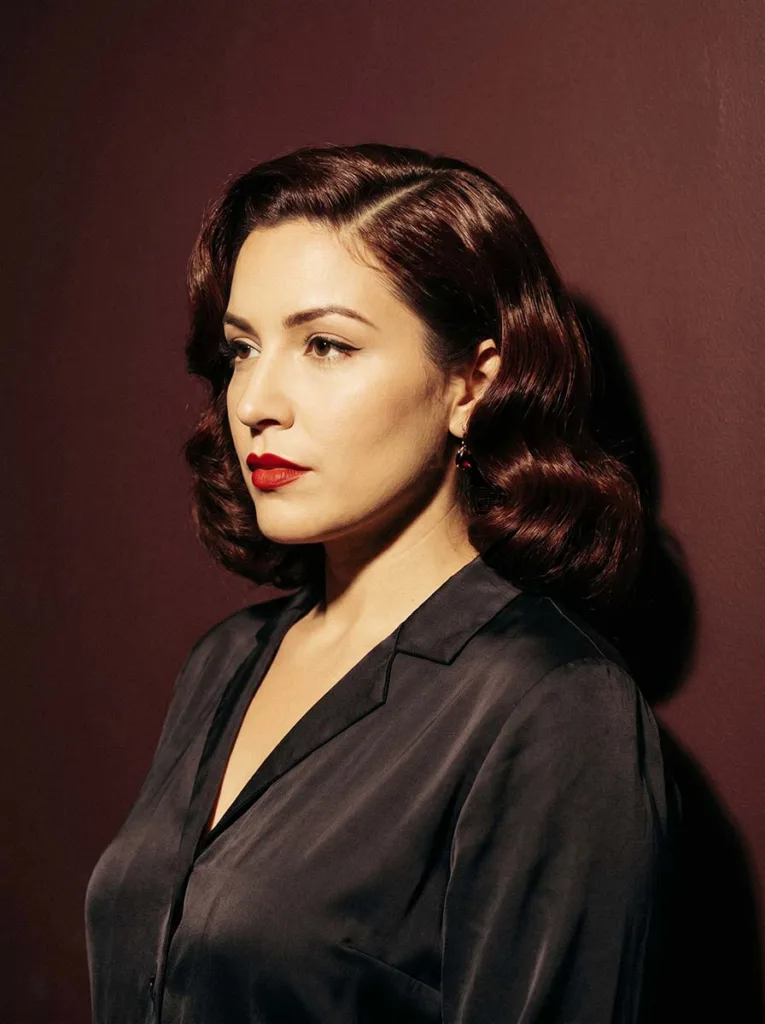 Woman with vintage-inspired bixie haircut featuring finger waves and side part — vintage bixie hairstyle