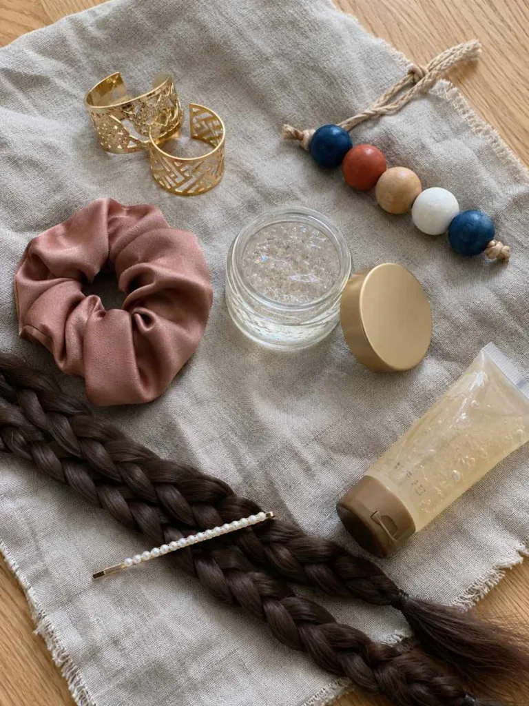 braided space bun accessories gold cuffs wooden beads satin scrunchie glitter gel edge control