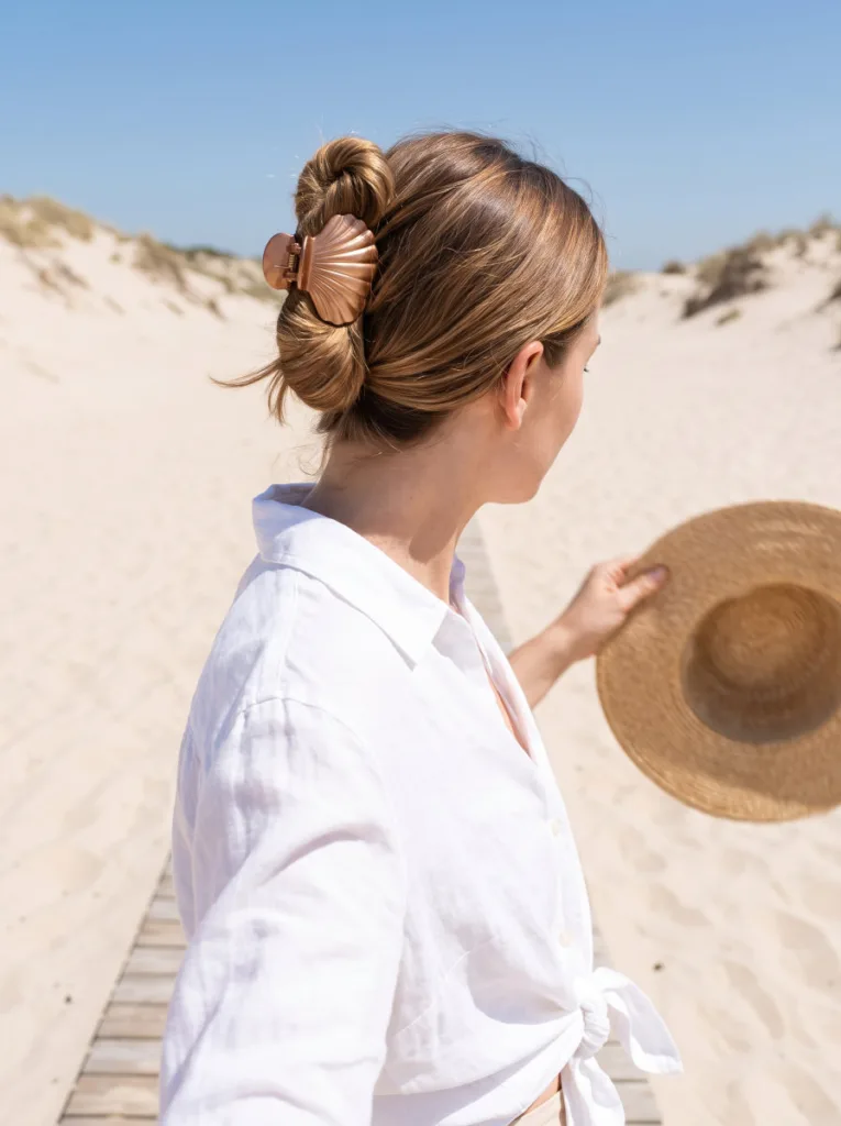 Rope twist shell clip bun on shoulder-length hair with visible braid texture