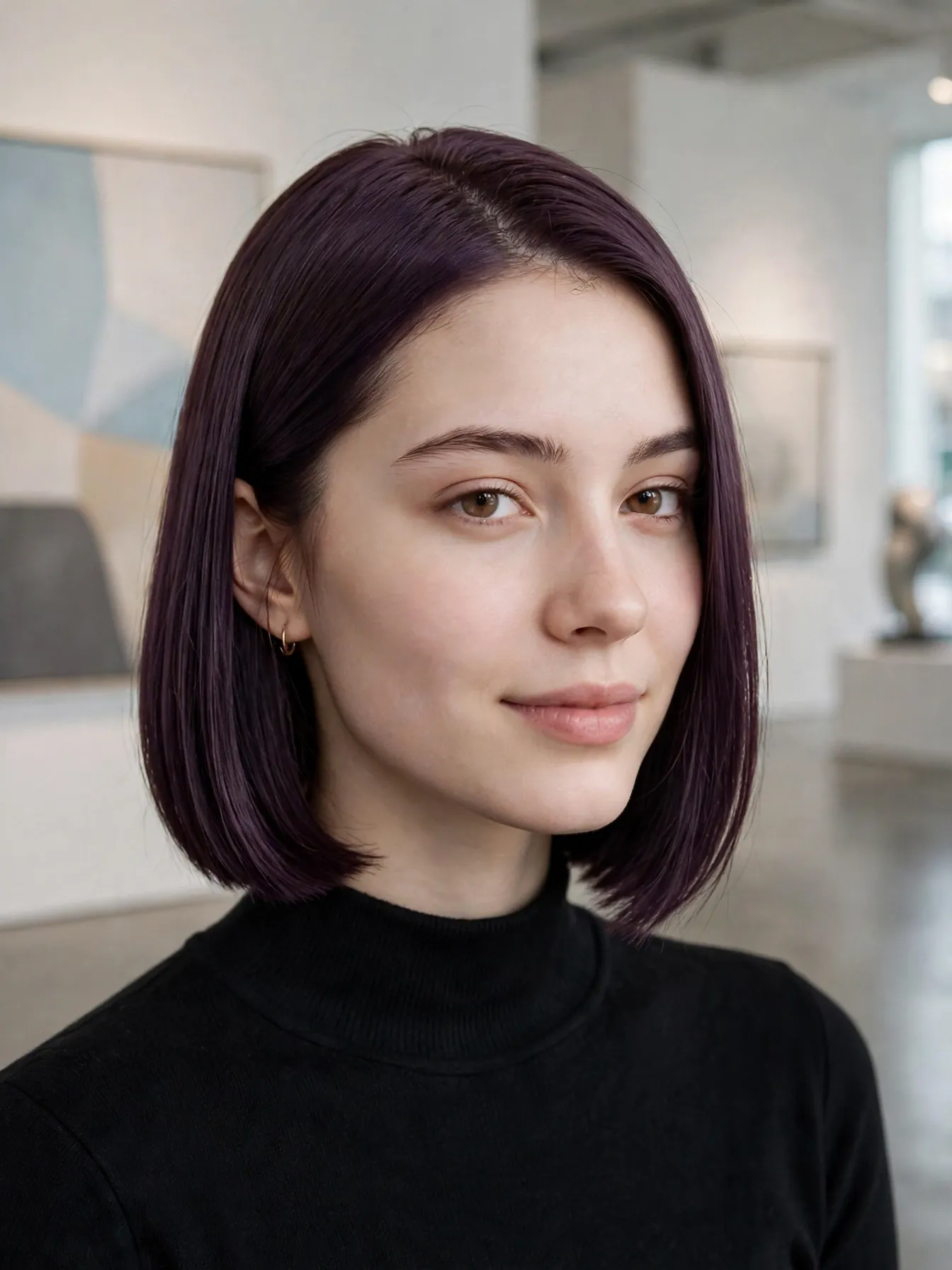 Chin-length plum brunette bob haircut with even violet color